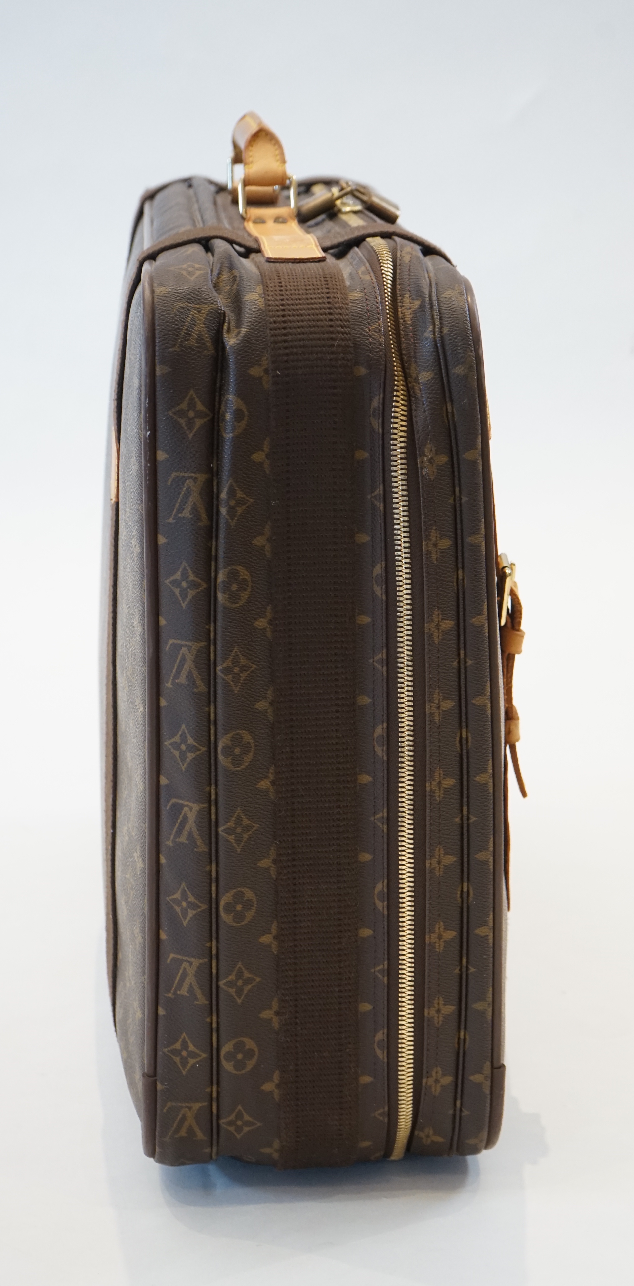 A Louis Vuitton Satellite 65 travel bag width 65cm, depth 19cm, height 46cm